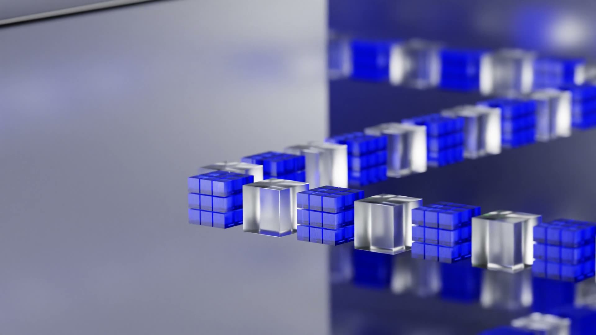 Abstract animation of translucent cubes flowing across a dark surface